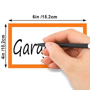 Hand writing on an orange-bordered label. Dimensions shown: 6in/15.2cm width, 4in/10.2cm height. Partial text visible: 'Gara'.