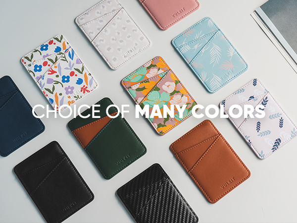 a collection of different wallets on a table.