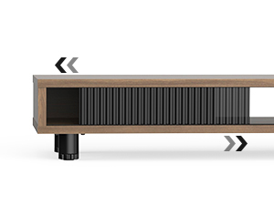 Modern, low-profile heater with a wooden top and black metal body featuring vertical slats. Minimalist design for home heating.