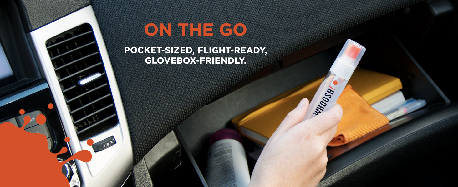 Hand placing WHOOSH! screen cleaner in a car glovebox, emphasizing its portability.