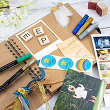 Scrapbooking supplies on table