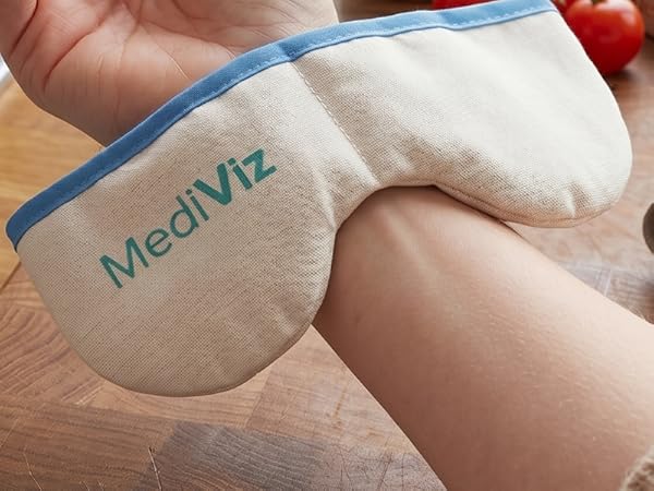 Woman testing inner mask on wrist.