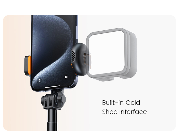 Smartphone mount with cold shoe interface attachment point, showing black phone holder and white rectangular accessory mount.