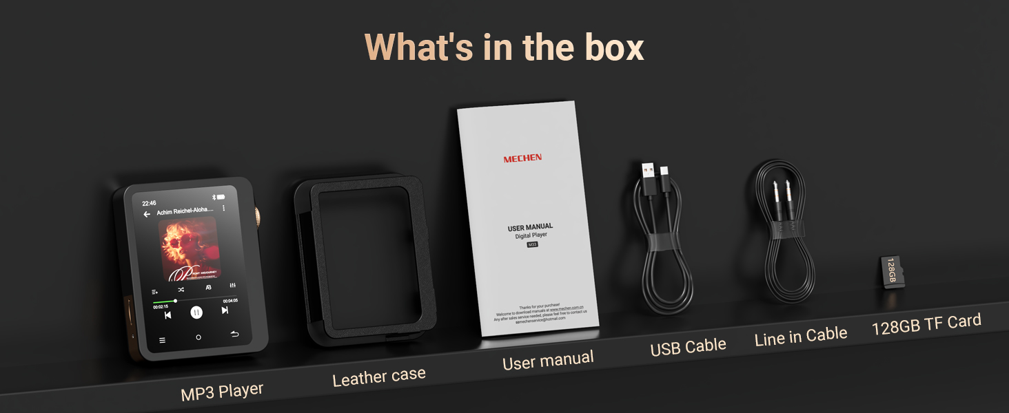 Text reads 'What's in the box'. Product packaging contents display showing various components including a device, power adapter, USB cable, and instruction manual laid out on dark surface.