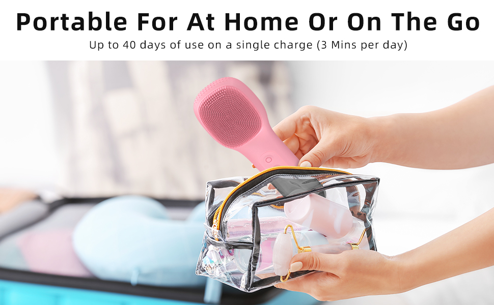 Text reads 'Portable For At Home Or On The Go'. Image shows hand cleaning eyeglasses with pink cleaning tool against light blue background.