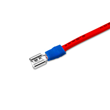 Electrical connector with blue plastic body and red wire, featuring a metal prong or pin at the end.