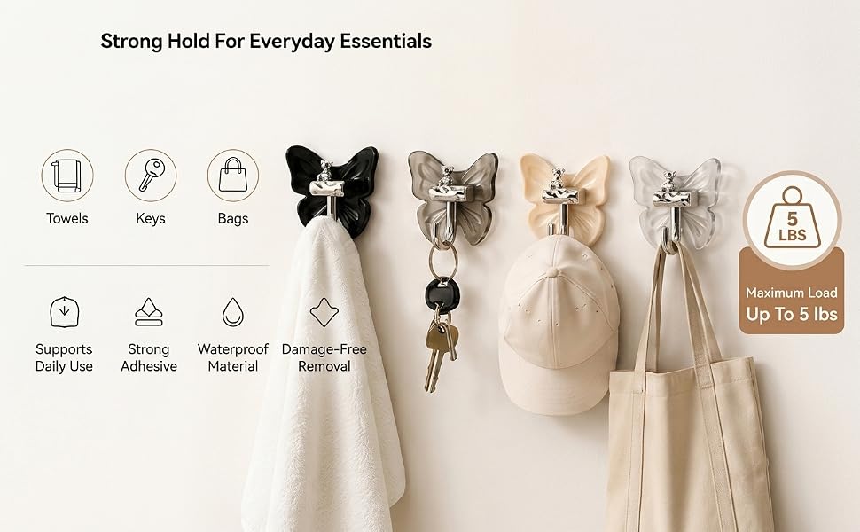 Heavy-duty adhesive wall hooks holding towels, keys, hats and bags.