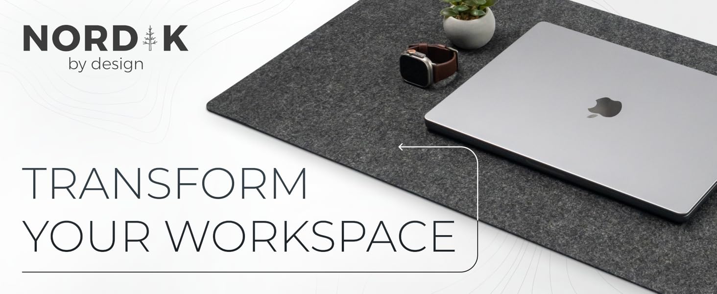 macbook laptop on charcoal felt mat with desk plant - transform your space