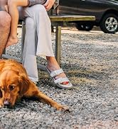 Family spending time together outside of their RV