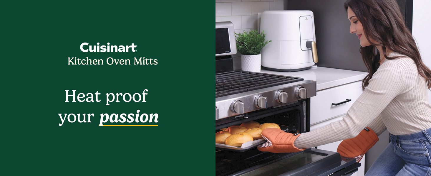 woman using oven mitts to take bread out of oven