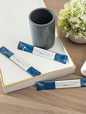 GO Mouthwash packets in BOLD mint flavor on the rest room table.