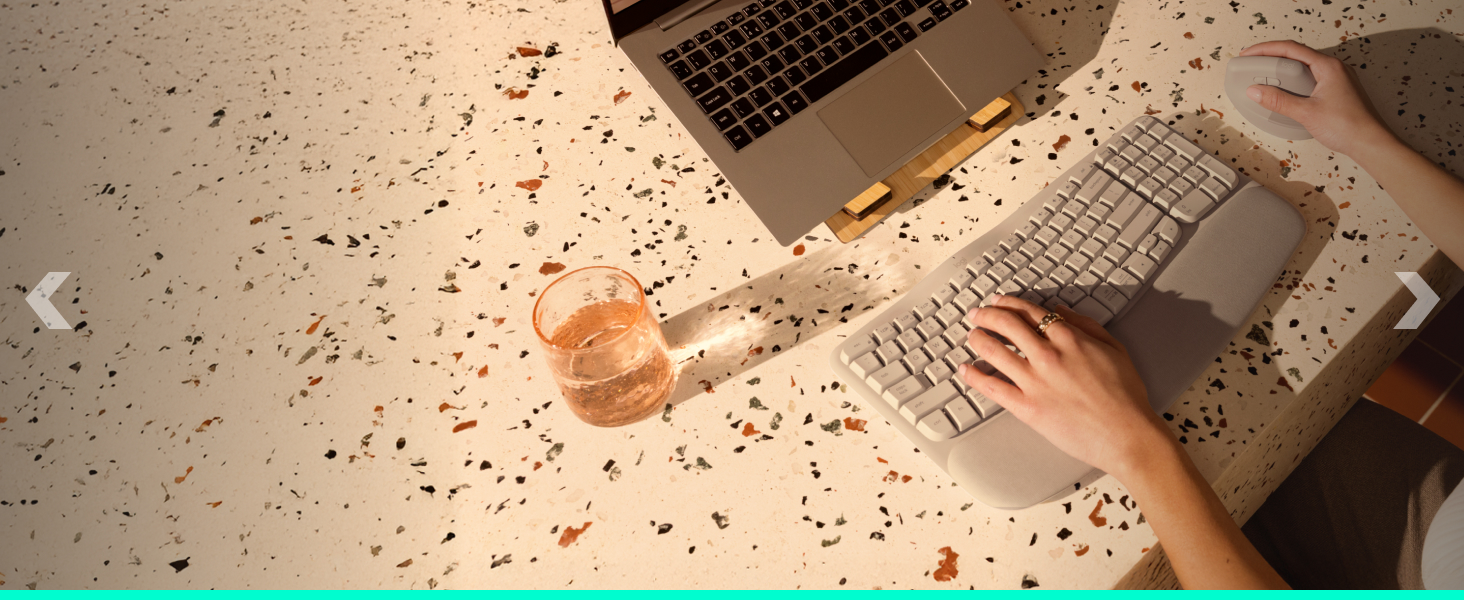 a woman using a keyboard and a mouse