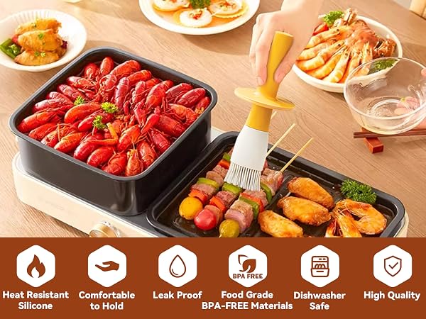 Two-compartment cooking tray with crayfish in one section and mixed grilled items in the other. Silicone basting brush nearby. Icons below show product features.