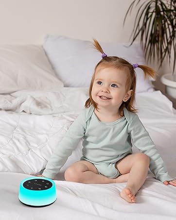 Baby with white sound machine