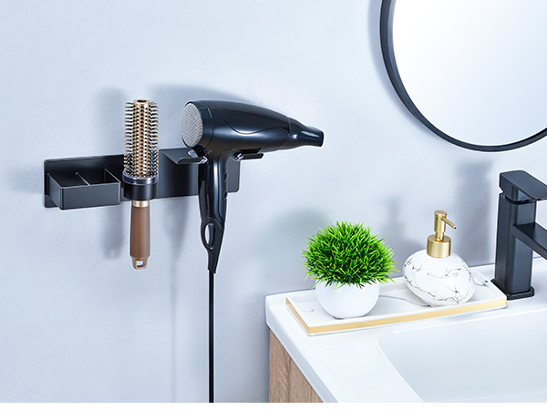Modern matte black bathroom fixtures including faucet and shower components arranged against white background.
