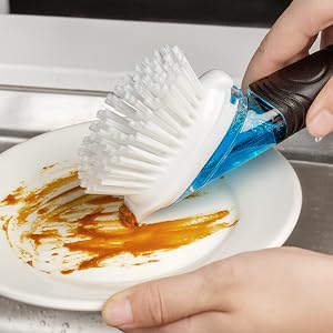 Built in scraper on brush head backside easily removes stuck-on food.