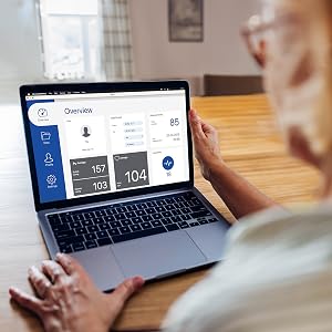 person reviewing their blood pressure results on a laptop using the Microlife Blood Pressure App
