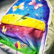 a rainbow blanket with a rainbow butterfly design