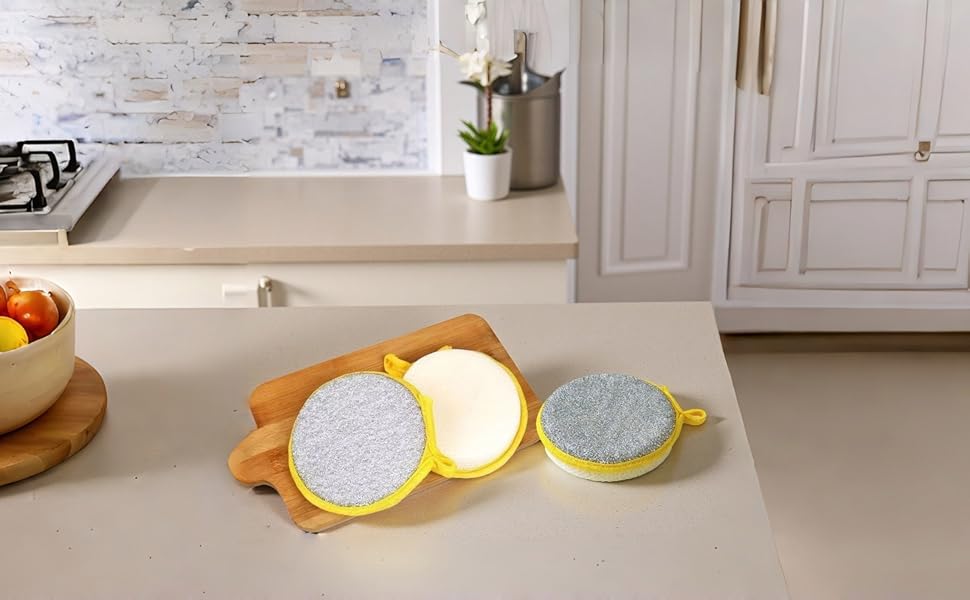 Double-sided sponge: scrub tough messes, wipe surfaces gently.