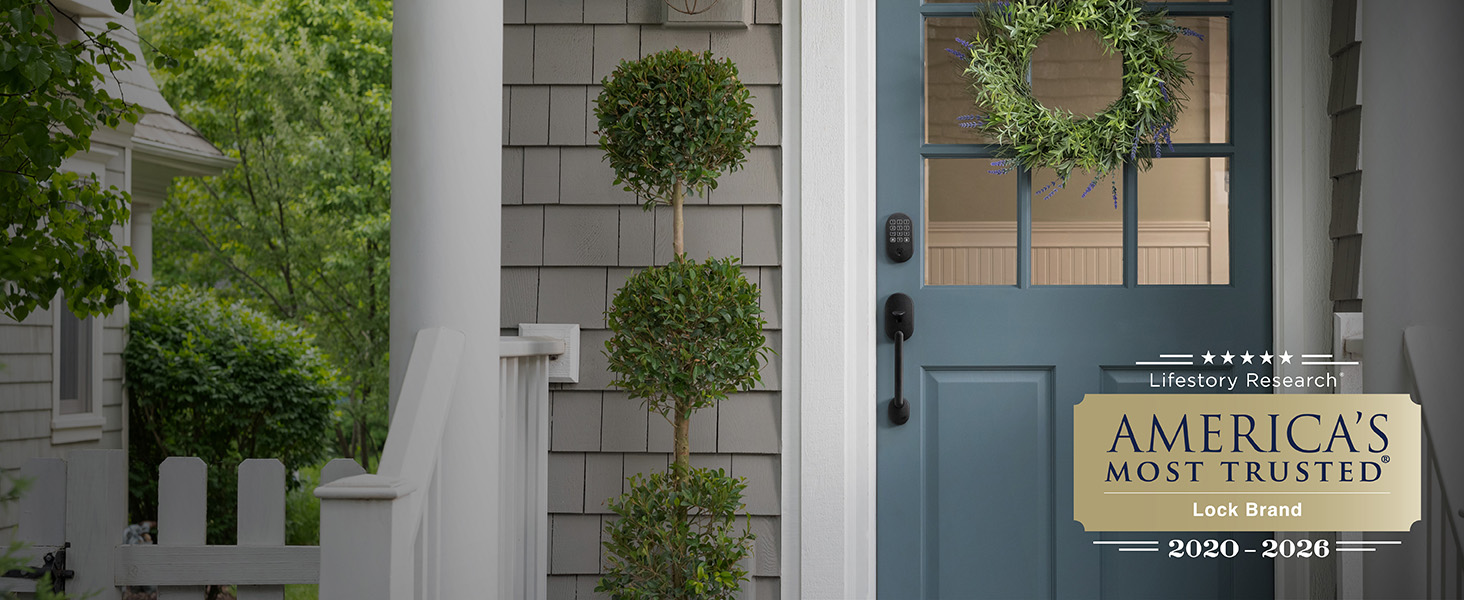 Schlage smart lock and door handle grip on front door of home voted America's Most Trusted