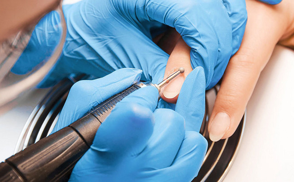 Purism 4 mil Nitrile disposable gloves used for precision manicure & beauty.