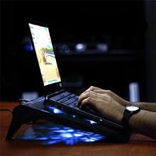 hands typing on laptop