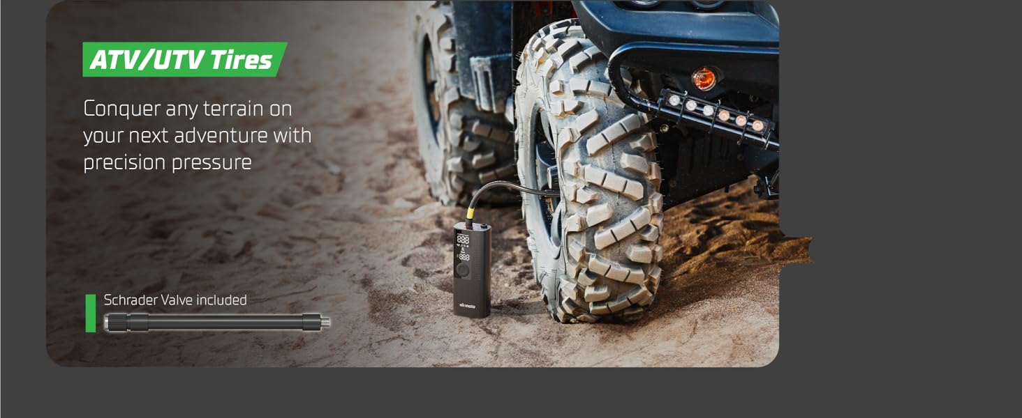 Portable tire pump for car being used roadside with bright LED light feature visible