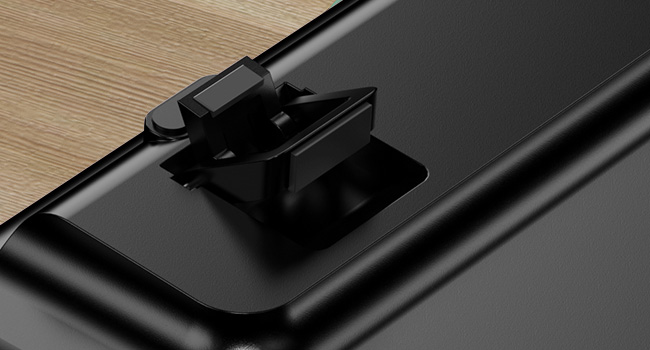 Close-up of the adjustable tilt leg on the Green Black keyboard for a raised typing angle.