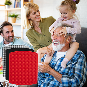 family playing together after dinner with reusable mats