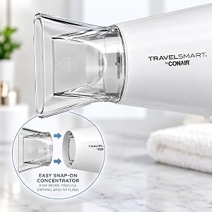 TravelSmart by Conair hair dryer close-up showing removable snap-on concentrator nozzle