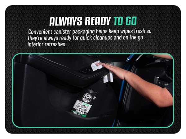Interior cleaning wipes removing dirt from vinyl, leather, fabric, and glass surfaces inside vehicle