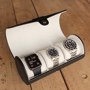Open black watch roll that protects watches