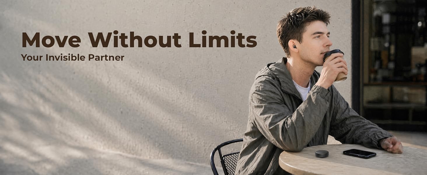 Man wearing a mini invisible wireless earbud while having coffee, nearly unnoticeable