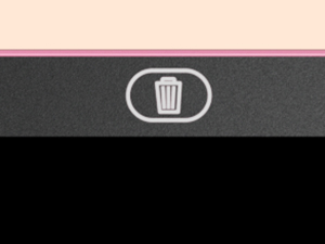Close-up of a digital interface element showing a trash can icon in white against a dark background.