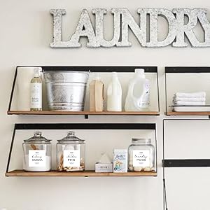 Organized laundry room with Mintitude labels