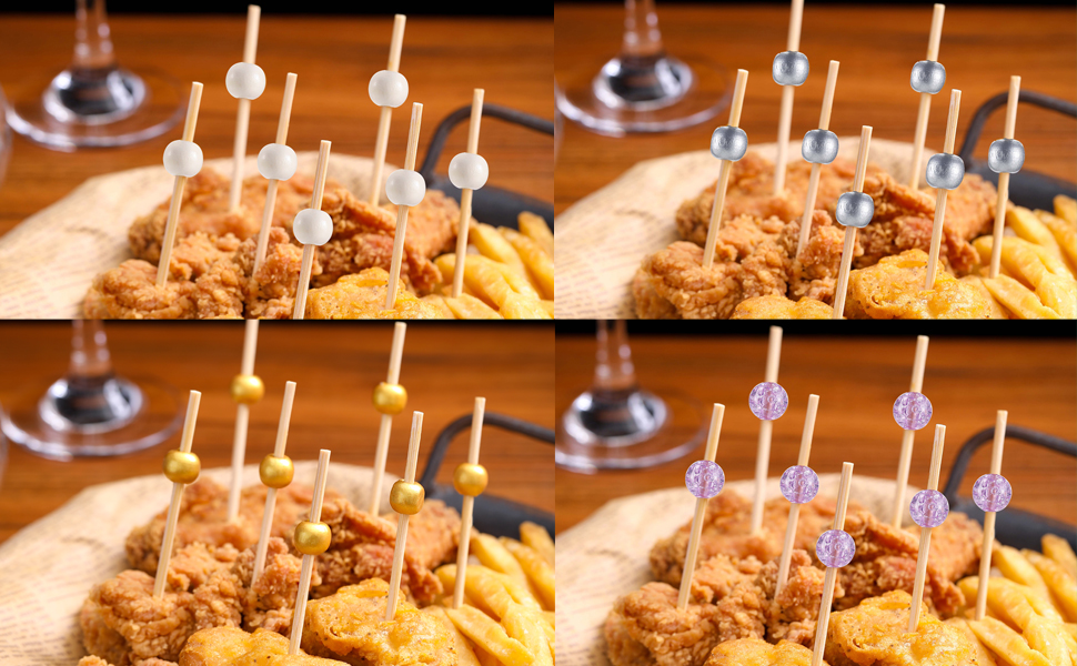 a picture of a plate of food with toothpicks on them.