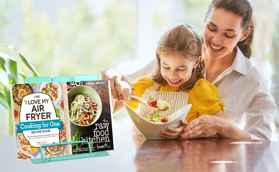 a woman and child eating a meal