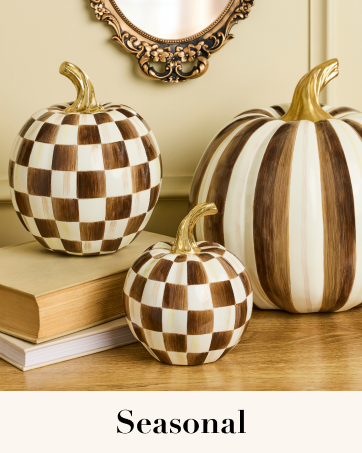 Decor indoors and out with seasona pumpkins in a variety of checks and colors.