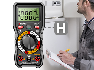 Digital multimeter with LCD display being used near electrical panel. Device features rotary selector dial and multiple testing ports.