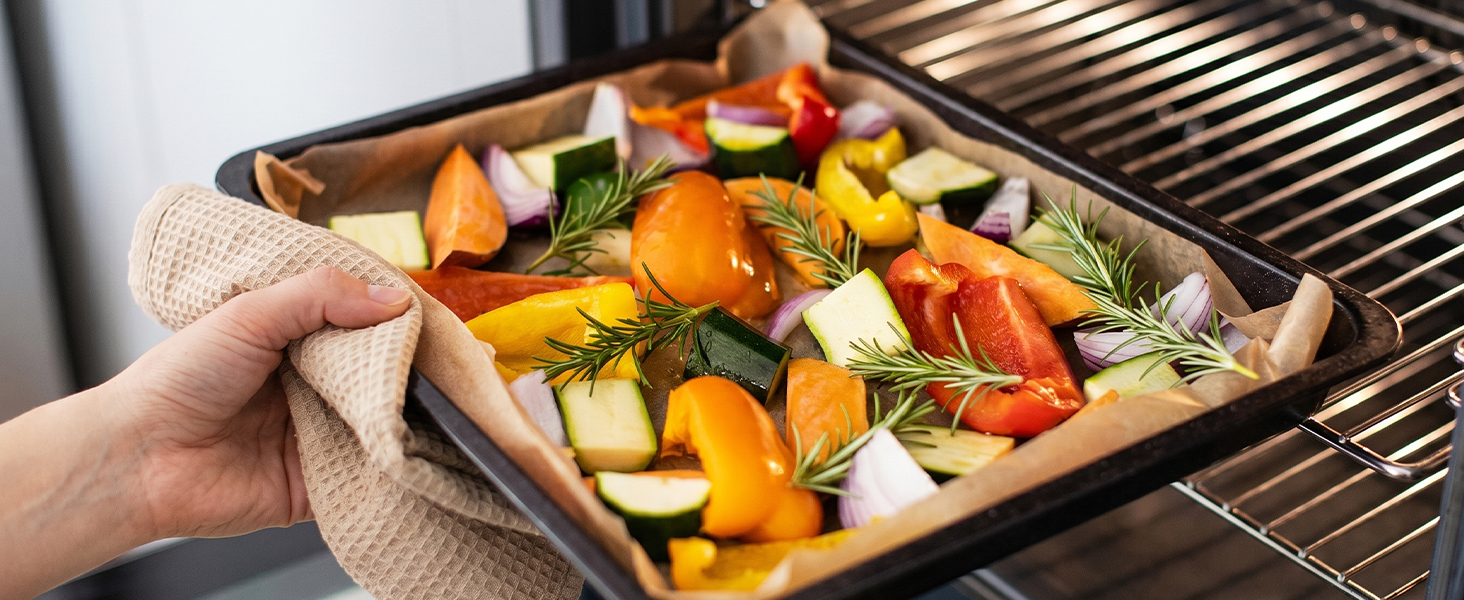 Zufaugc 9x13in precut parchment paper sheets for oven baking roasted vegetables.