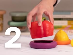 Leftover vegetable is held over a silicone food saver with a lemon saver.