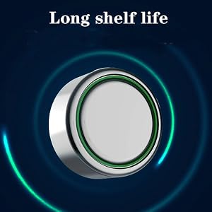 Circular silver device with green ring, glowing on dark background. Text reads 'Long shelf life'. Possibly a button cell battery or similar product.