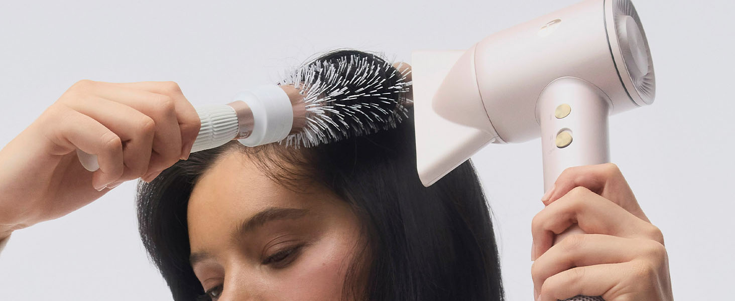 Drying hair with LuxeDry and brush