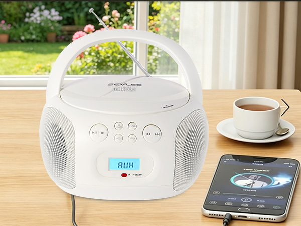 Smartphone connected to CD player via AUX input cable playing music.