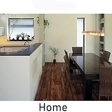 a picture of a kitchen with a table and chairs.