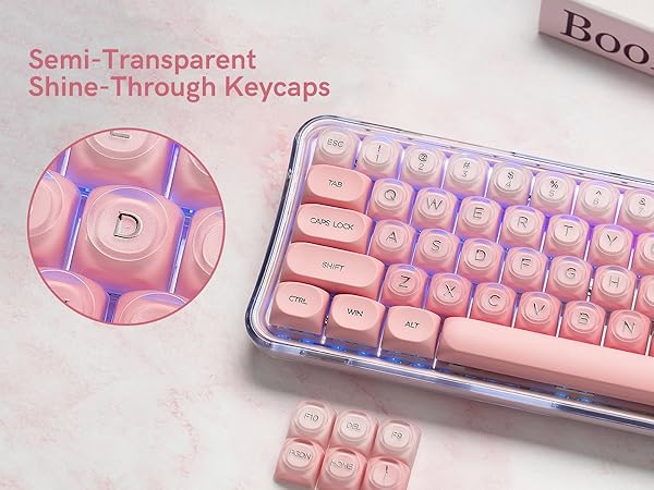 a keyboard with semi-transparent shine-through keycaps, featuring a pink color scheme
