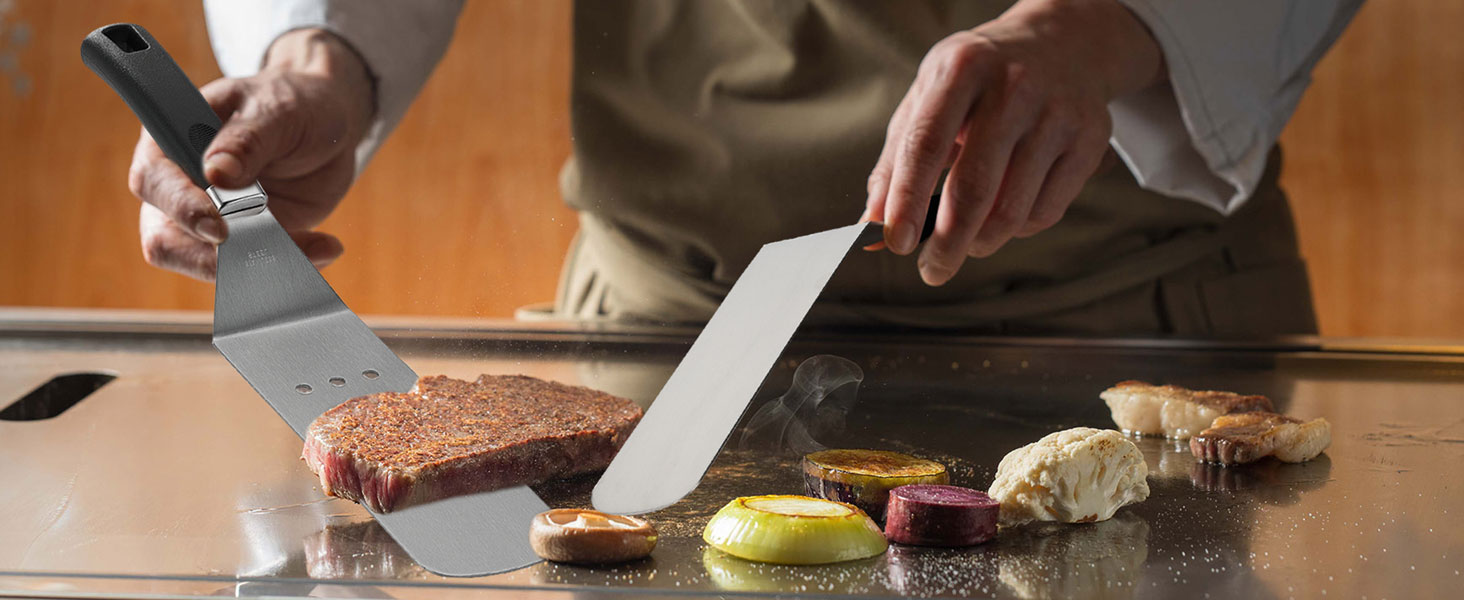 Hands using kitchen knives to slice bread and vegetables on a wooden cutting board, demonstrating proper knife handling techniques.