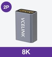 Text reads 'BK'. Product appears to be a black electronic device with purple lighting or display, mounted in a retail environment with shelves visible in background.
