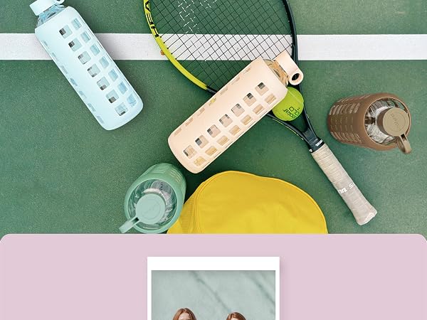 Glass water bottle with fruit infuser insert for flavor