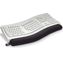 Ergonomic computer keyboard with split design, featuring white keys and black wrist rest pad against white background.